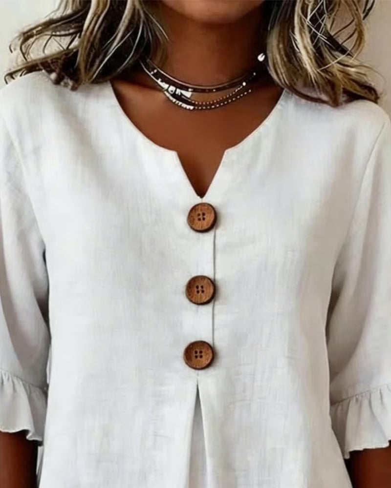 Janet | V-Neck Blouse with Wooden Buttons and Ruffled Sleeves